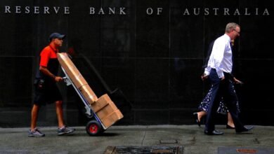 Australia’s central bank says policy is restrictive, causing households pain