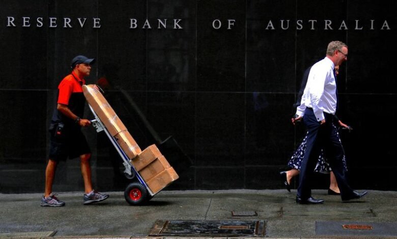 Australia’s central bank says policy is restrictive, causing households pain