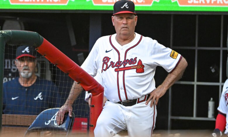 Braves manager Brian Snitker OK after taking Ozzie Albies foul ball to the groin