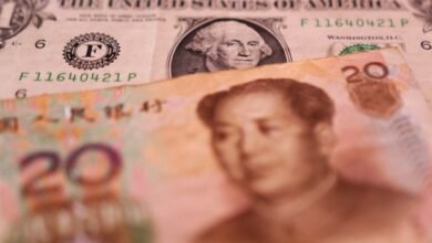 Yuan creeps higher as dollar wobbles ahead of Jackson Hole