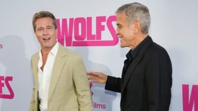 Watch Brad Pitt and George Clooney pal around on the red carpet at ‘Wolfs’ premiere